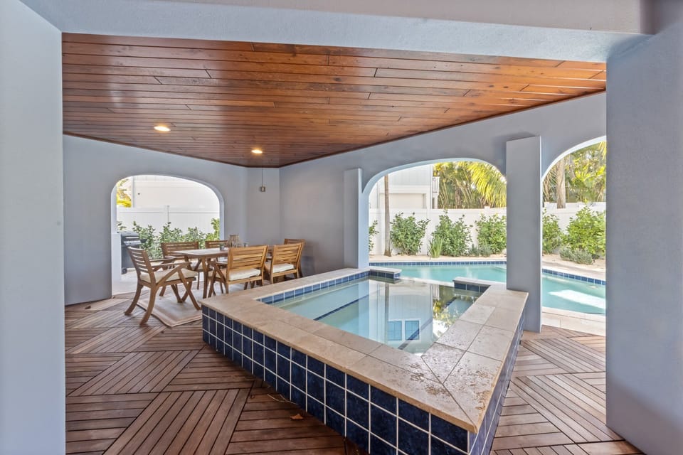 Covered spa and outdoor patio area