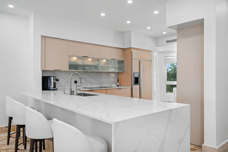 White melamine counter tops; Double sink.