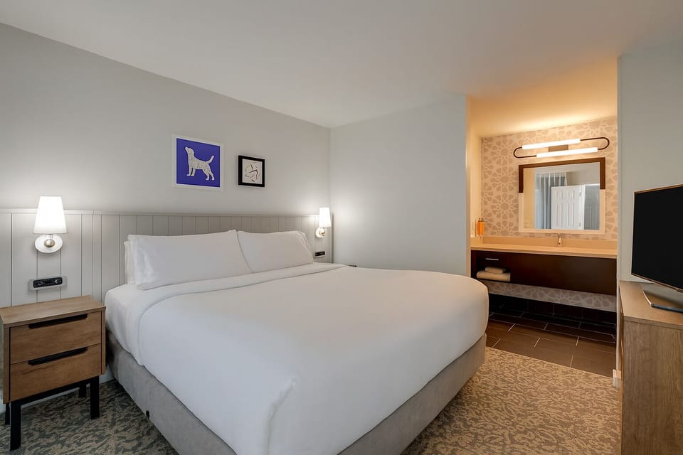 Unwind in a serene bedroom with convenient vanity nook.