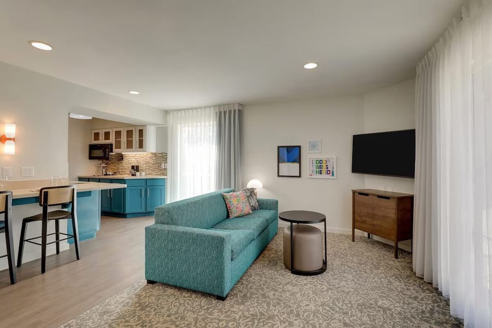 Settle into the open-plan suite for effortless lounging.