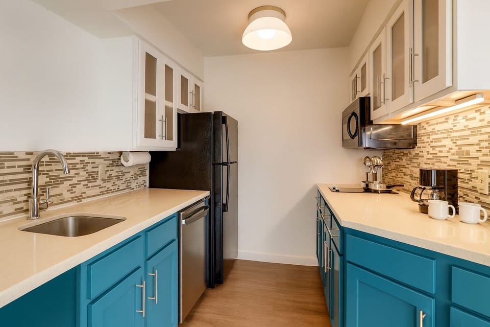 Cook with ease in a bright, modern kitchenette.