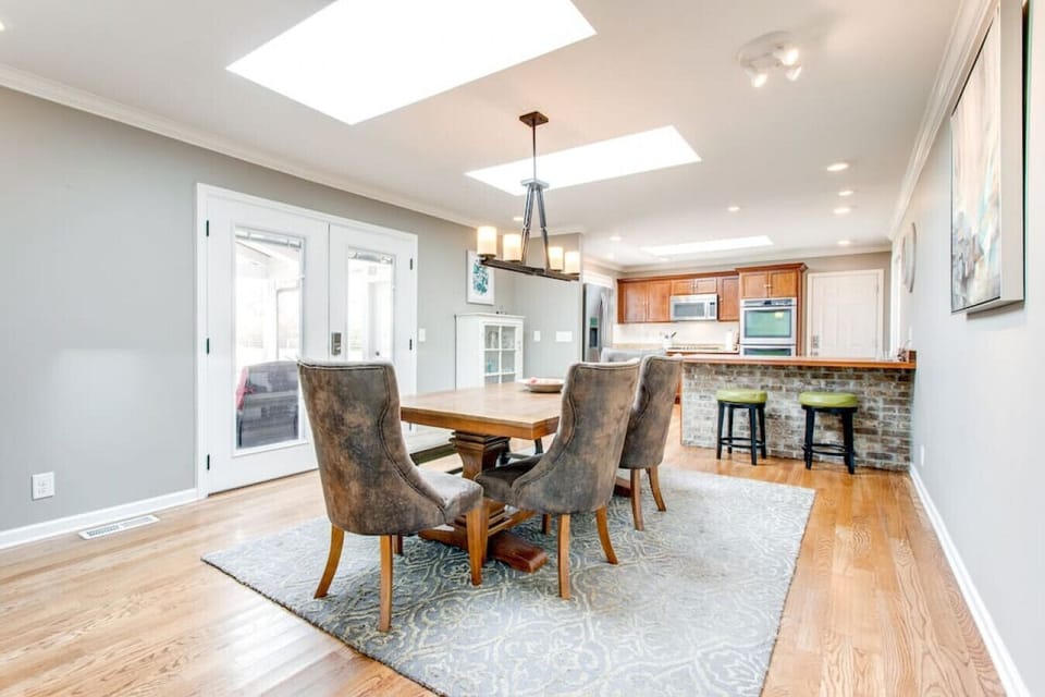 Dining Room with screen porch in the back.