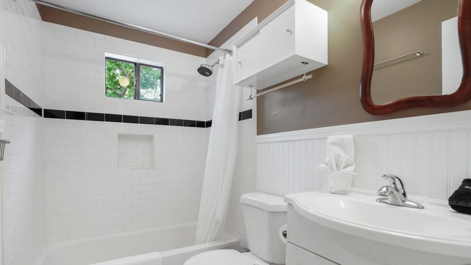 Full bathroom with all the essentials plus shampoo, conditioner, and body wash