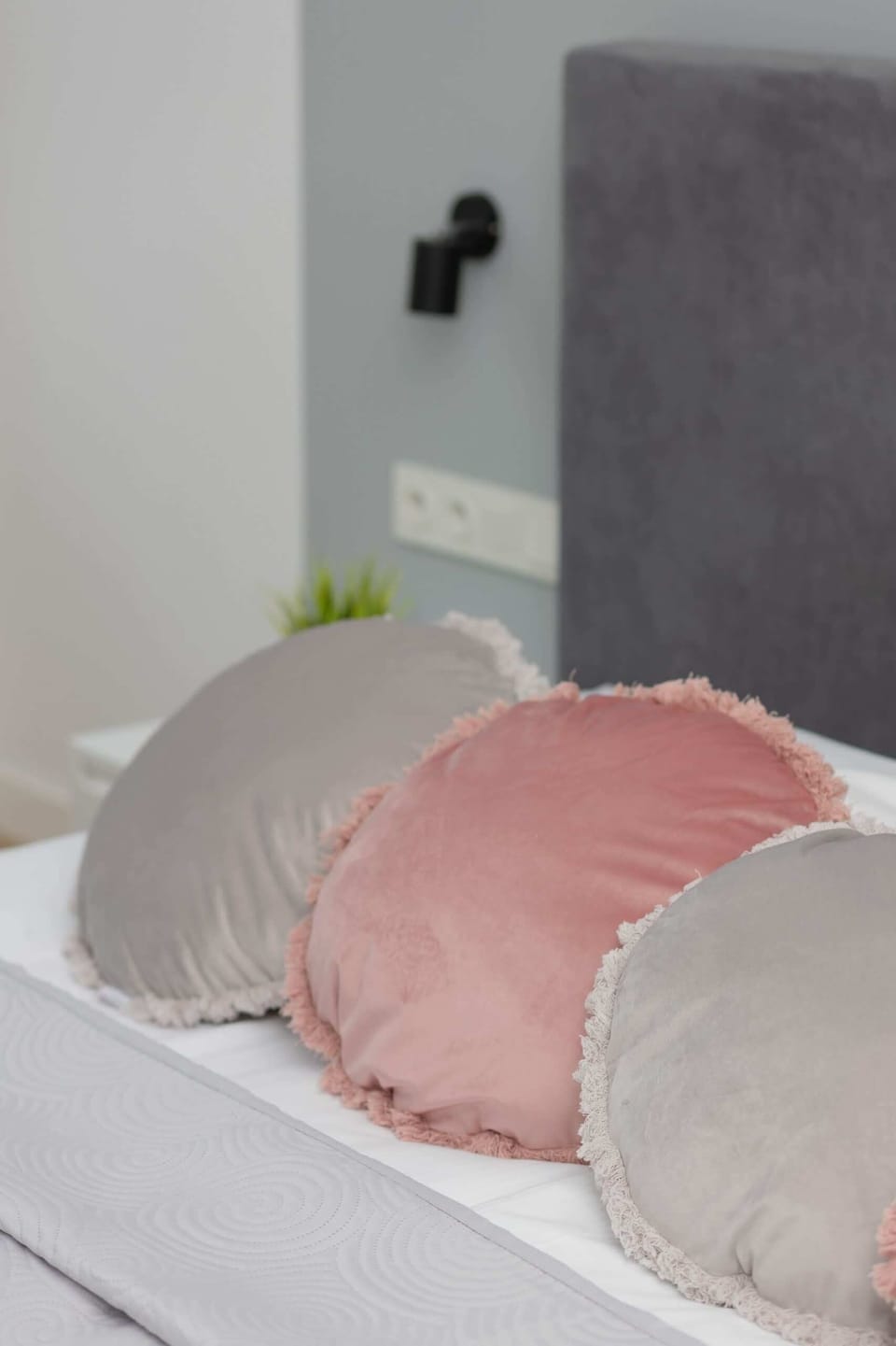 The bedroom's modern design ensures a comfortable stay. 