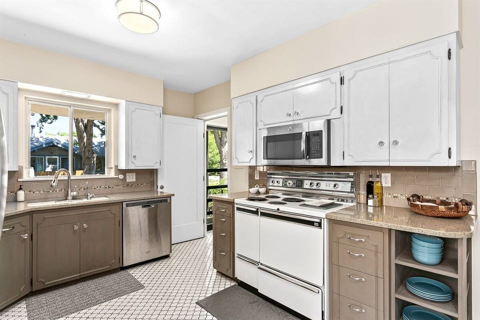 House 2: Spacious kitchen with natural light.