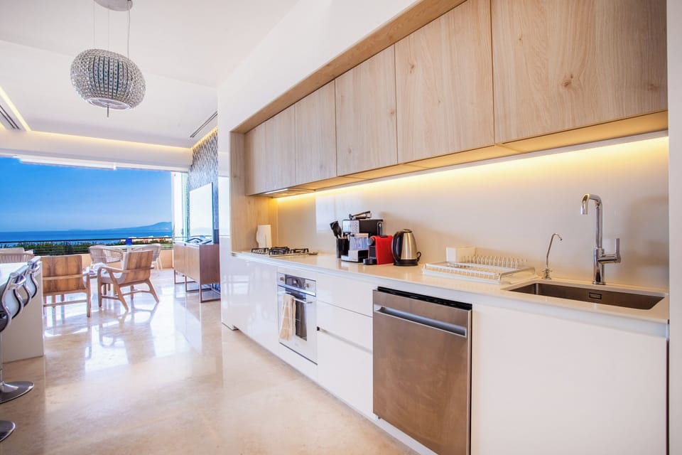 The gourmet kitchen includes a full-size refrigerator, stove, oven, microwave and dishwasher