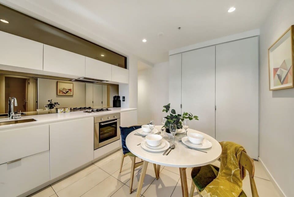 An equipped kitchen & dining area.