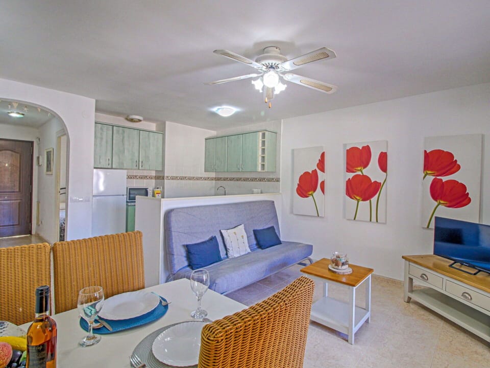 Furniture, Property, Table, Ceiling Fan, Comfort, Picture Frame, Living Room, Interior Design, Lighting, Building