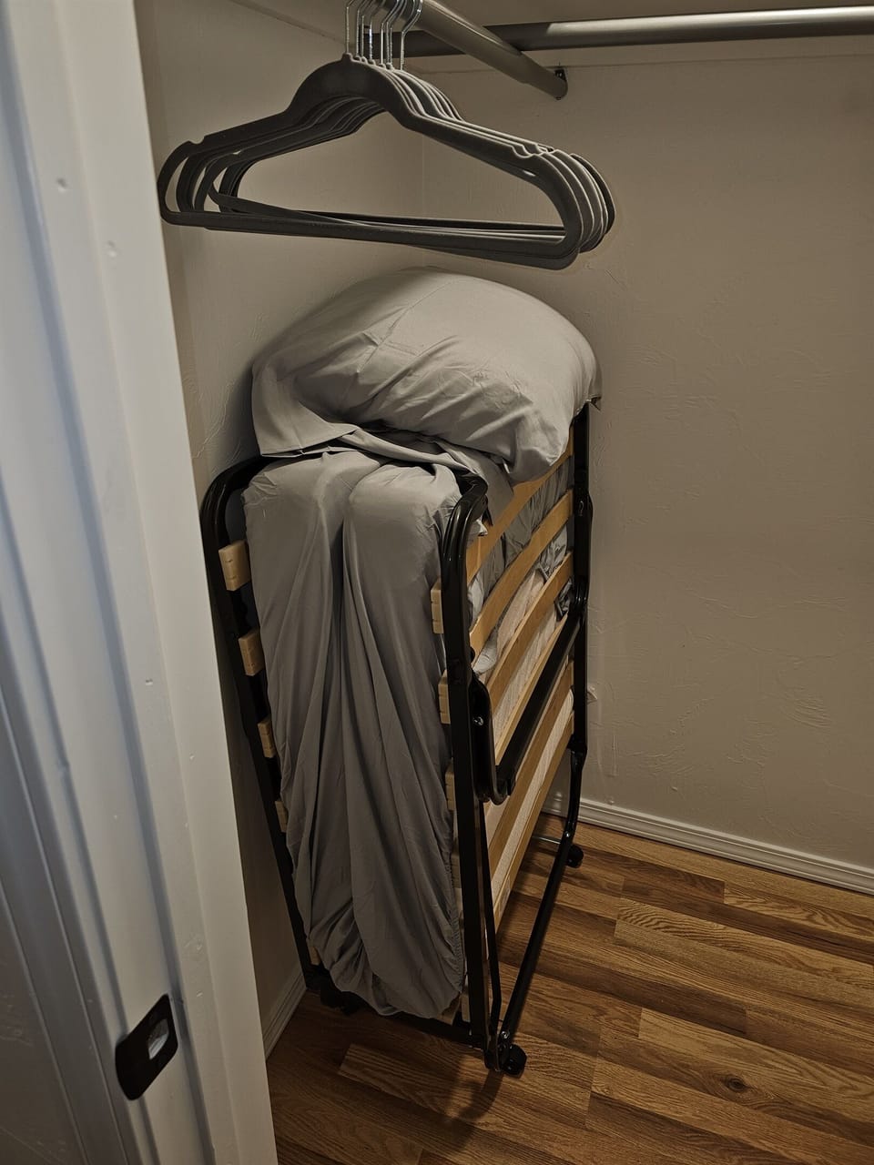 Rollaway bed located in master bedroom closet