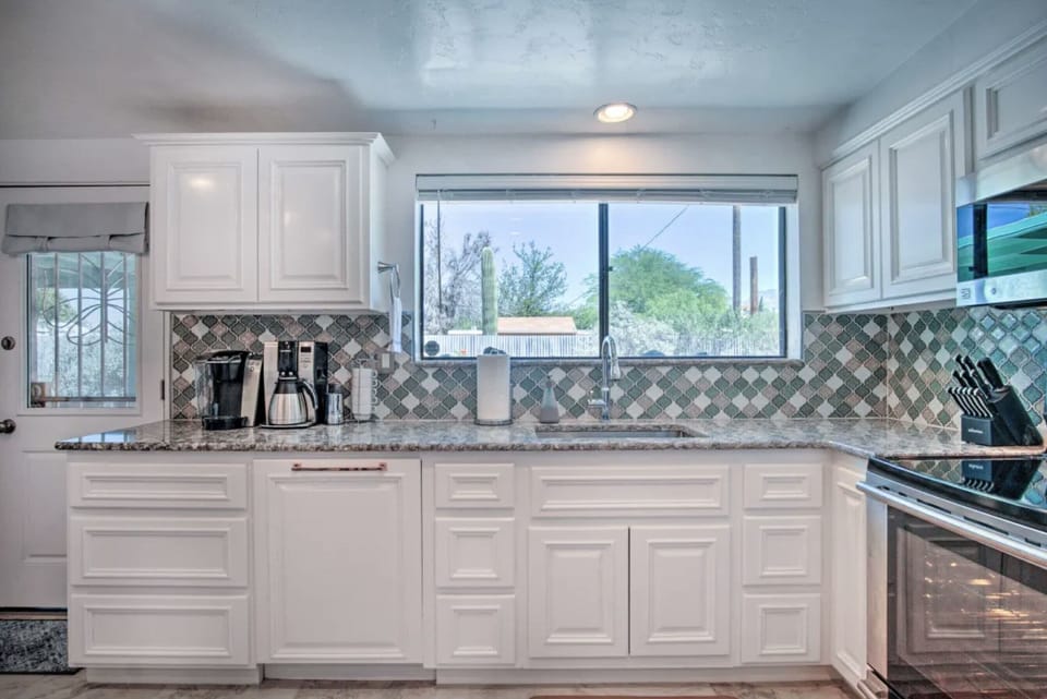 Enjoy the mountain views from the kitchen window. Extremely well stocked kitchen for the most discerning cook. Perfect triangle of access for ease of baking and cooking.