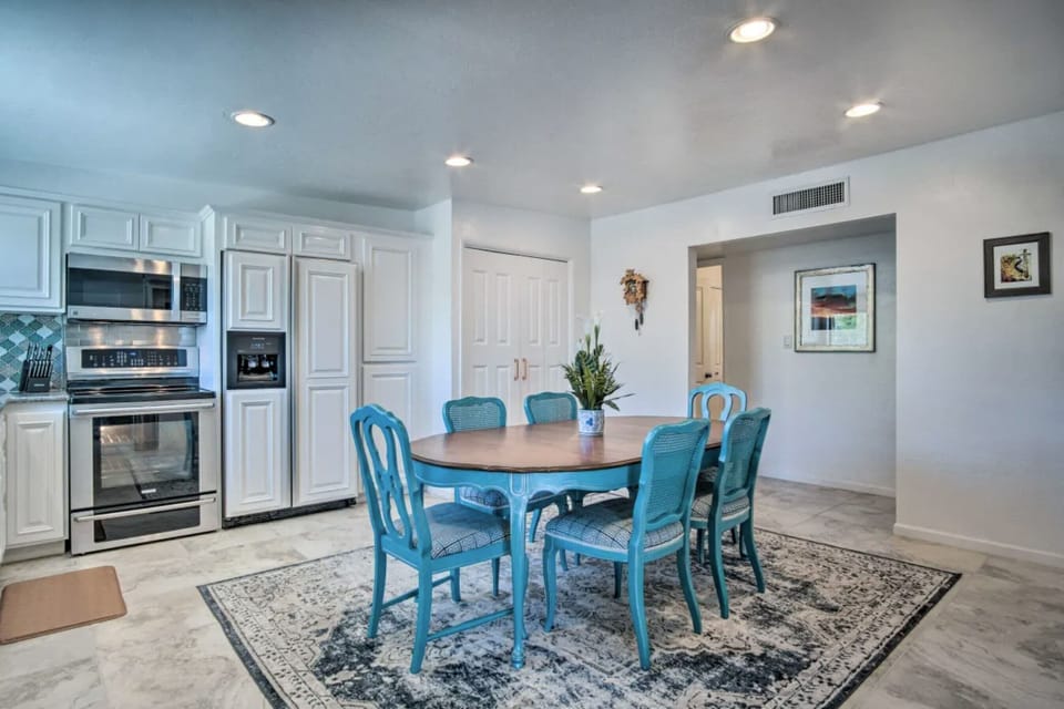 One off custom refinished dining room table is perfect for gathering around for dinner. There are two extra folding chairs in hall closet if extra space is needed.
