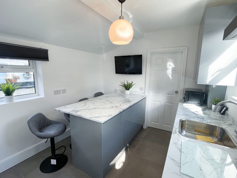 Kitchen Seating Area with TV