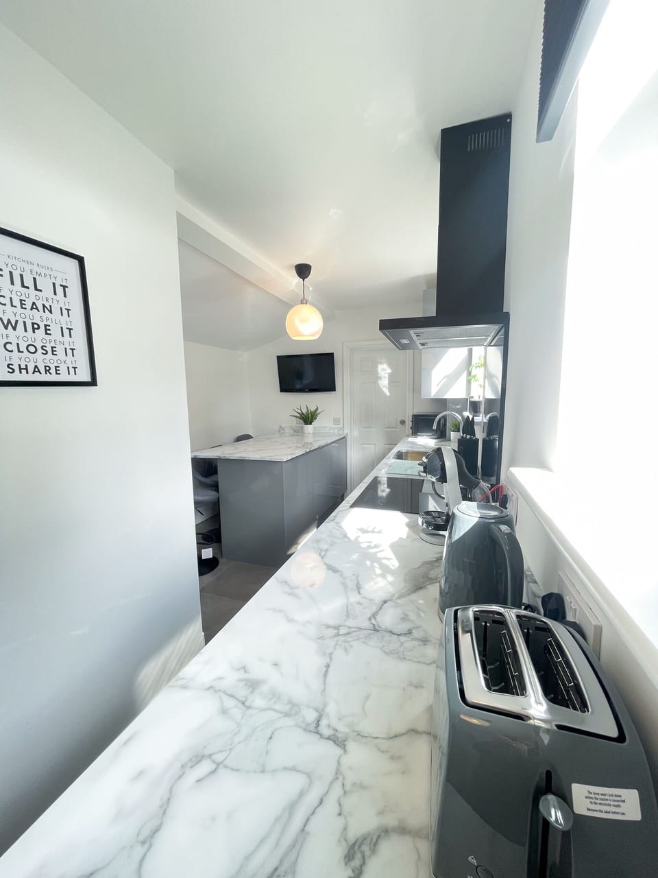 Large Kitchen with Seating and TV