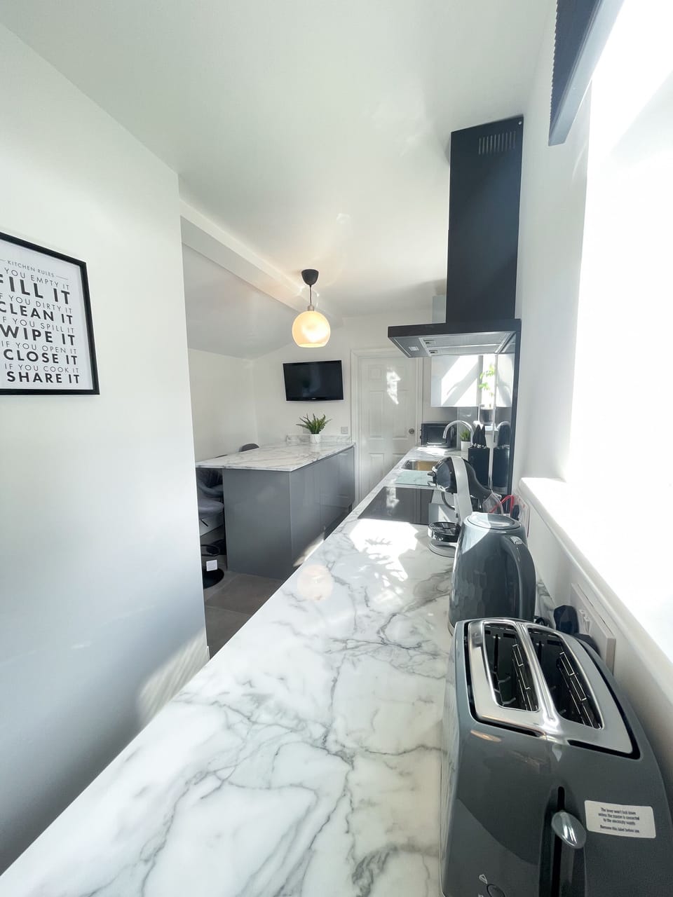 Large Kitchen with Seating and TV