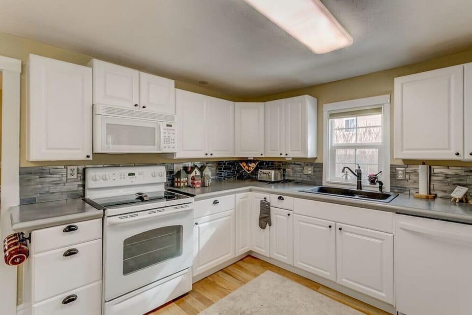 Stocked kitchen with access to main level bathroom