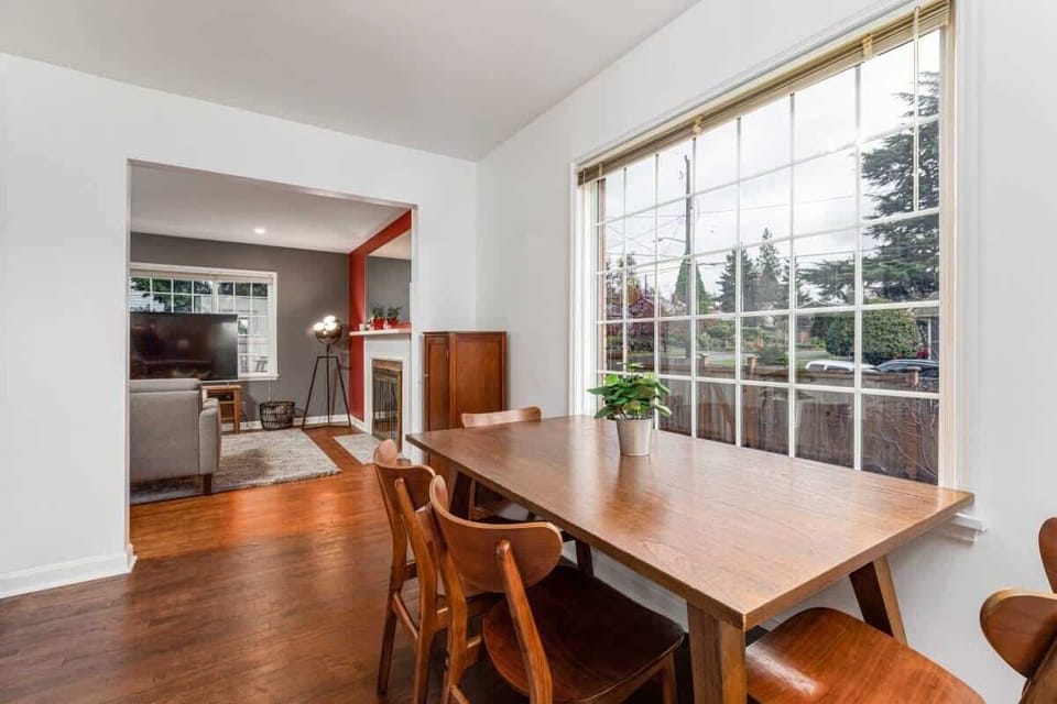 Dining table off the living room and kitchen