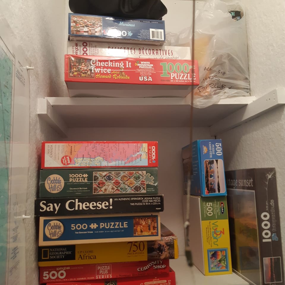 Games and puzzles are found in the dining room closet.