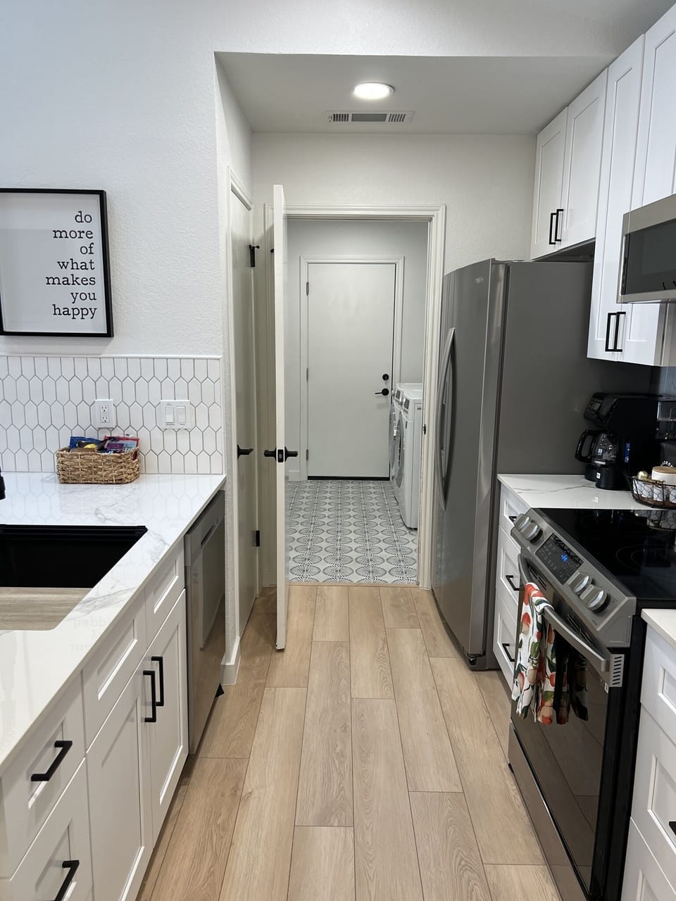 Brand new Kitchen leading to laundry room. 