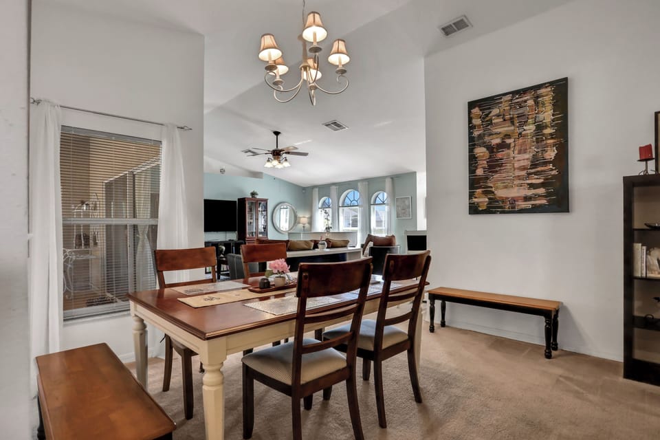 Like the rest of the house, the dining area features wonderful original artwork.