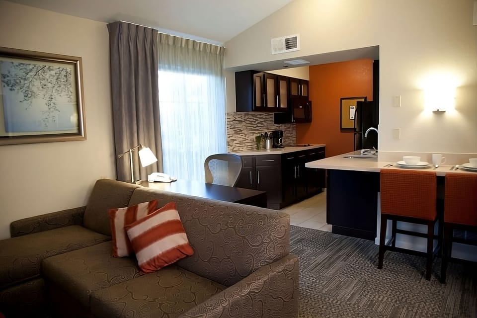Relax on the sofa after exploring, with bright open-plan comfort.