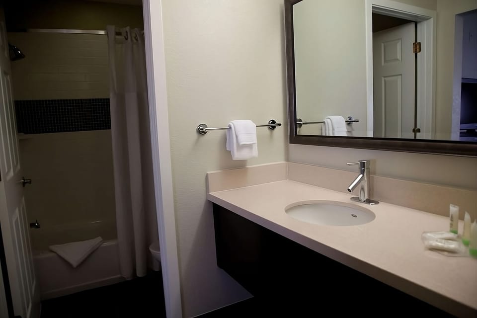 Stretch out and relax in a calm, modern king room.