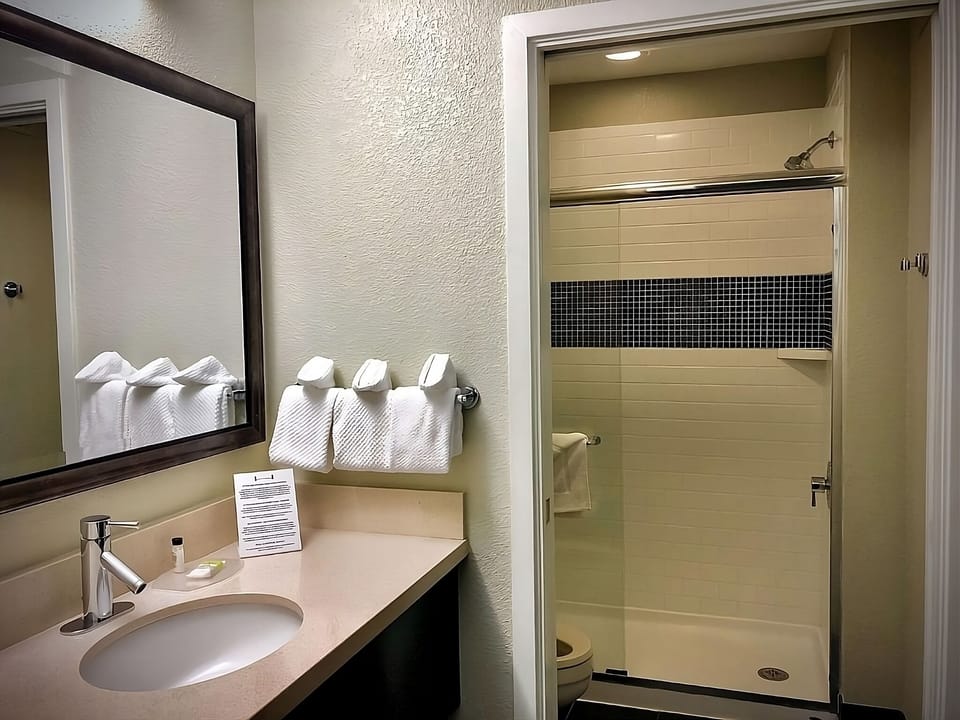 Refresh after adventures in a bright, spotless shower retreat.