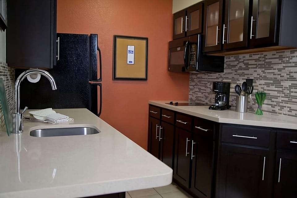 Cook and snack anytime with a sleek, fully equipped kitchen.