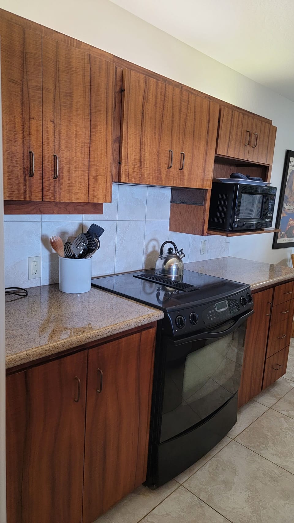 Large kitchen with Koa Wood Cabinetry 