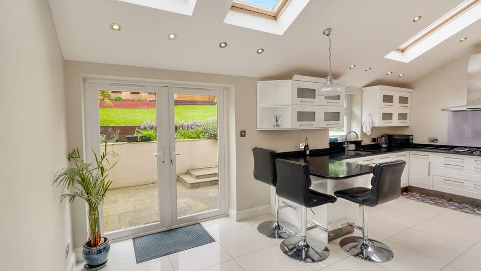 garden access door through kitchen..