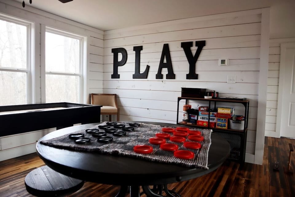 Game room with free arcade, shuffle board, board games, and more!