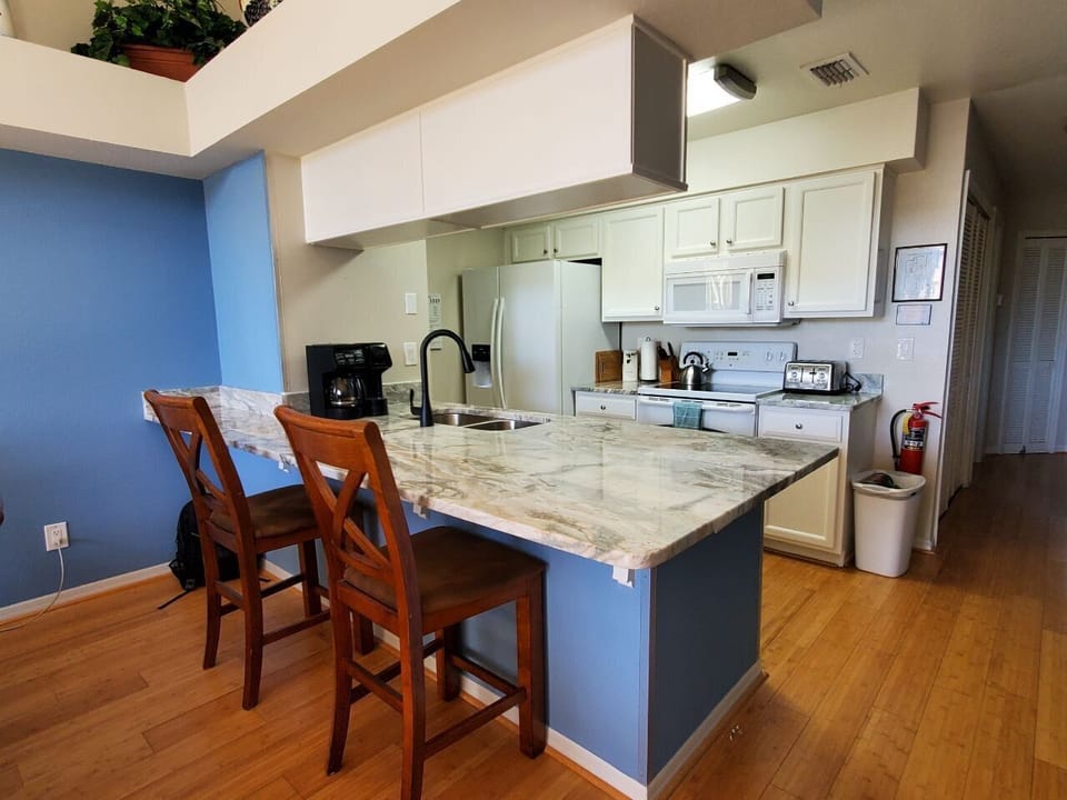 Updated Kitchen with Breakfast Bar and Granite Countertops