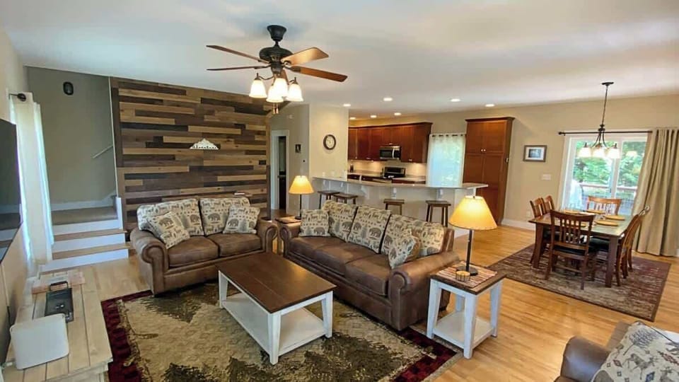The living space looking in the direction of the kitchen. The motif we went with is rustic cabin with a hint of farmhouse. It's very cozy!