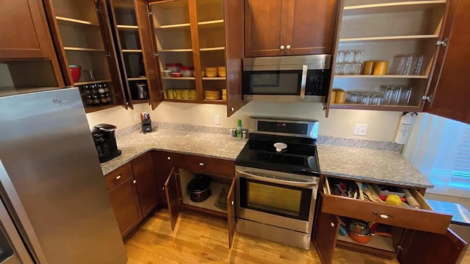 The kitchen is very well stocked for all of your dining and cooking needs.