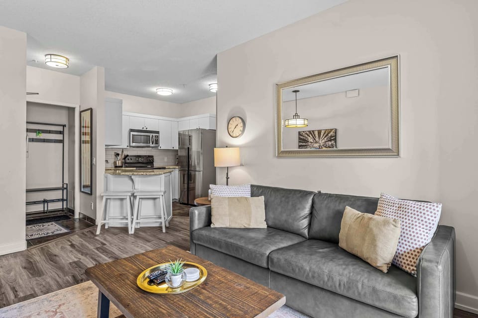 Living area with fireplace and balcony access