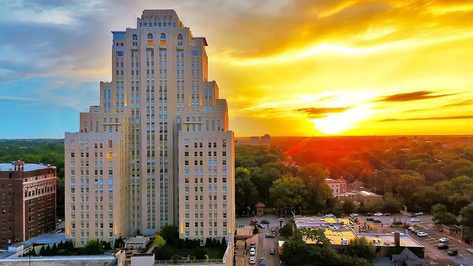 Arrive to a landmark skyline view glowing at golden hour.