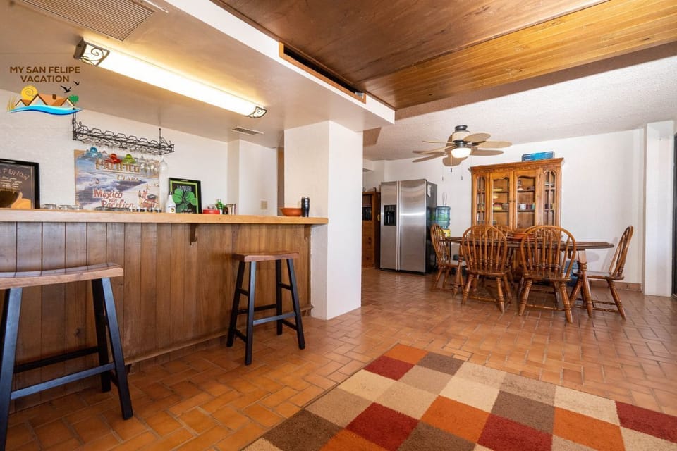 Gather around the dining room table at Casa Lopaz in La Hacienda San Felipe BC Mexico — perfect for meals and family time.