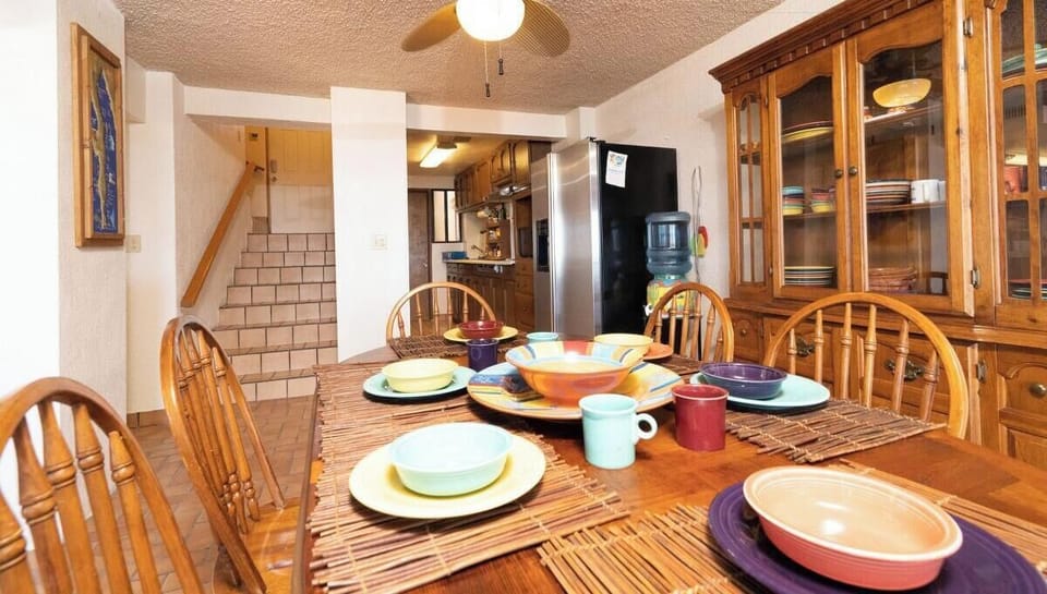 Share meals around the dining table at Casa Lopaz in La Hacienda San Felipe Baja California — ideal for family dinners.