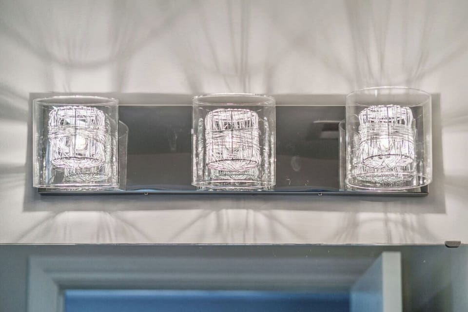 Wire wrapped vanity light for added beauty to our bathroom (2) 