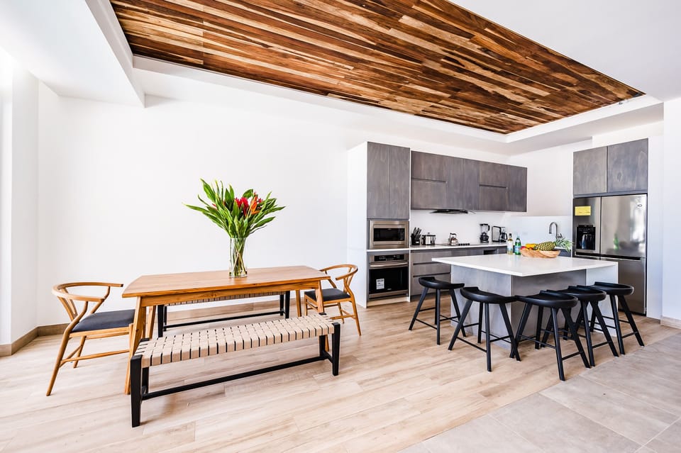 Casa Isabella ceiling accents feature local wood 