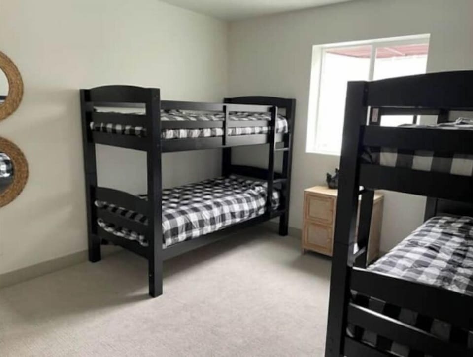 Basement 5th bedroom with twin bunks. 