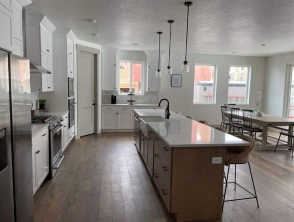 Fully stocked kitchen and dining table that can seat 12. 