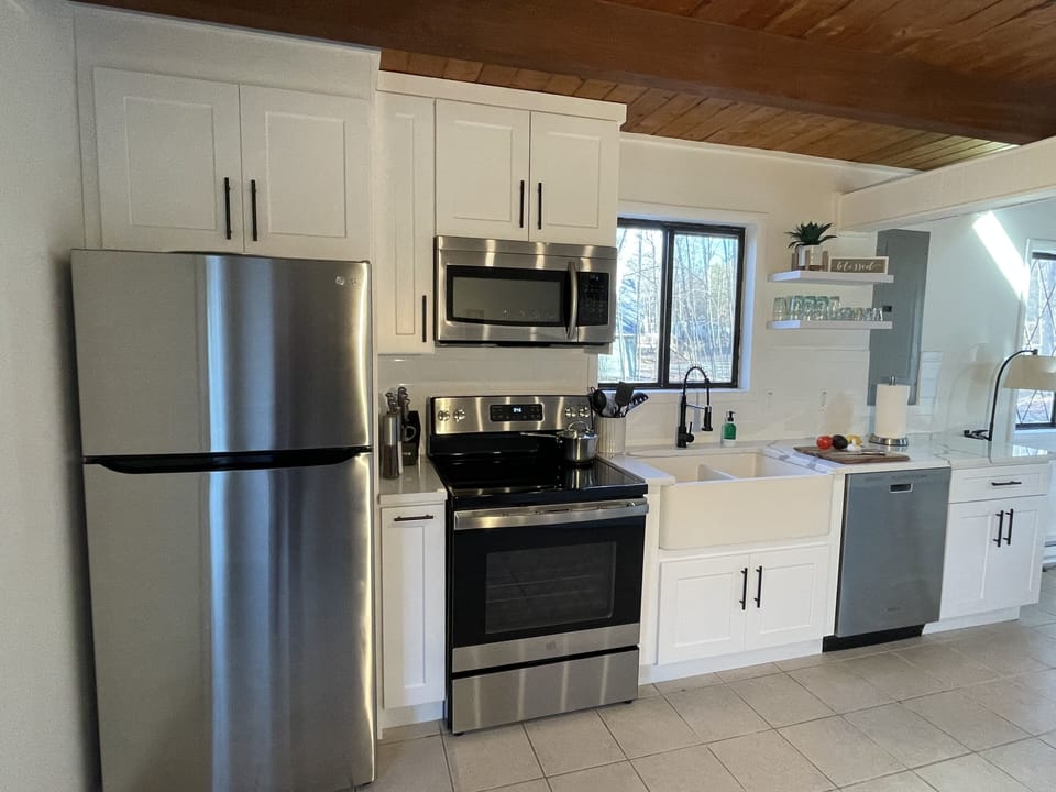 Whip up a delicious meal in this well stocked kitchen. 