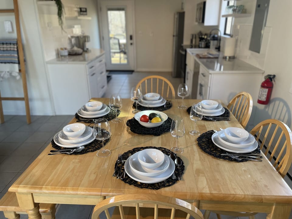 Spacious table with 4 seats and bench. 