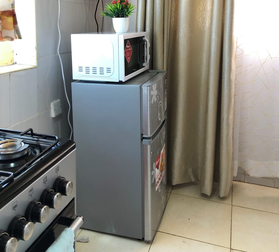 Fridge , microwave and cooker