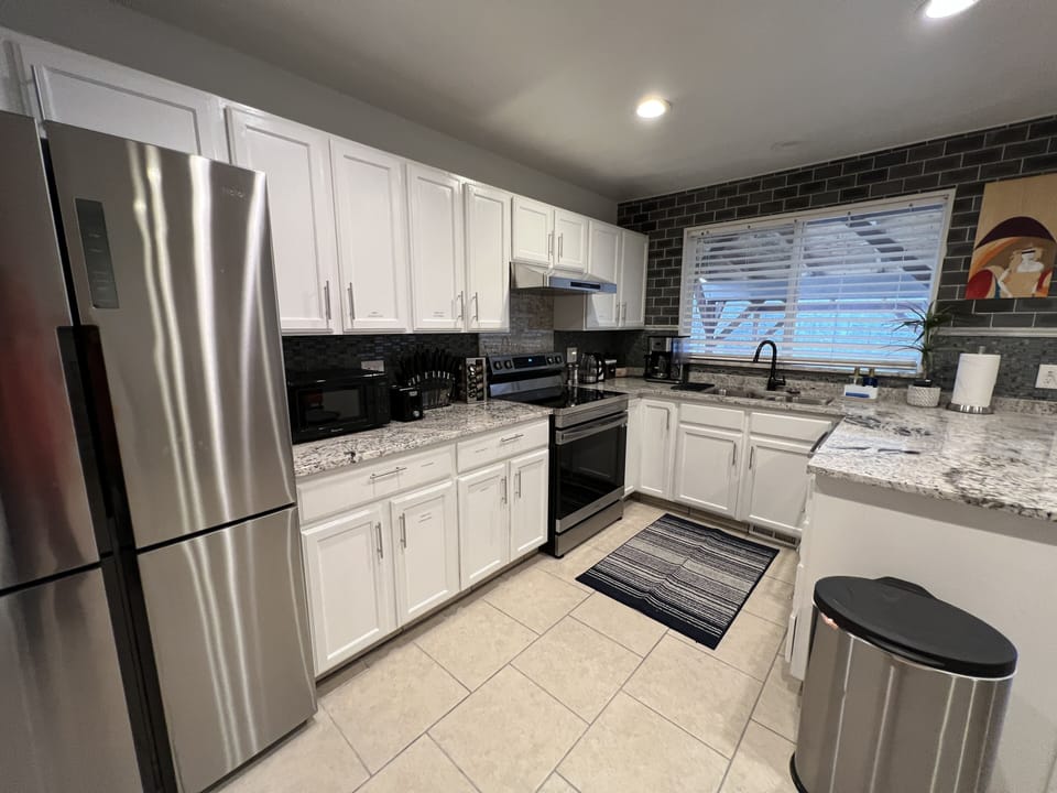 Kitchen with full supplies 