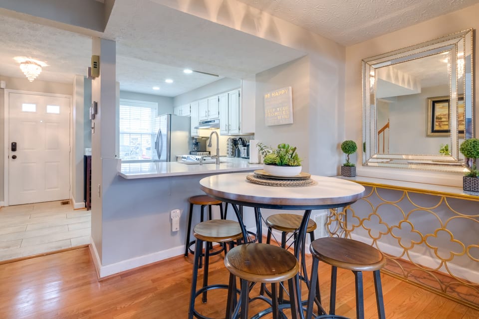 Dining Area | Dishware & Flatware Provided | Breakfast Bar w/ Additional Seating