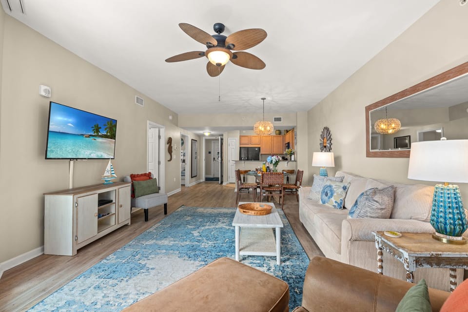 Queen sofa sleeper, and sliding doors out to your balcony w/ flat screen TV