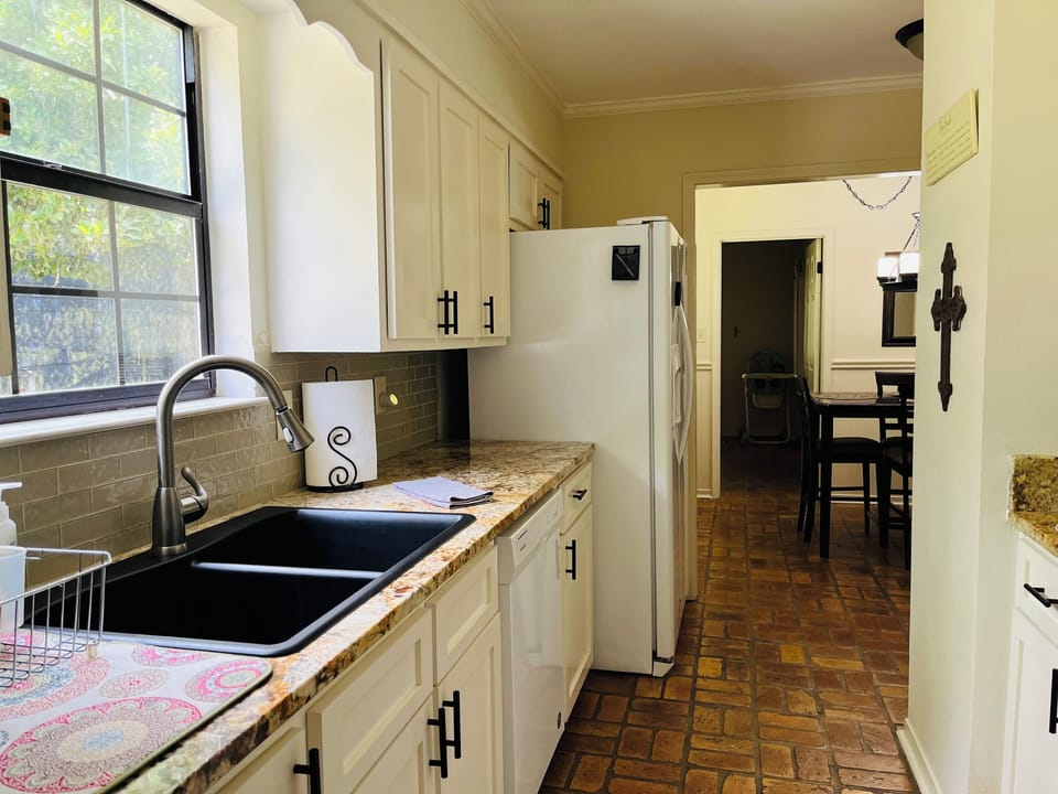 Galley-style kitchen with ample counter space for meal (or snack) prep