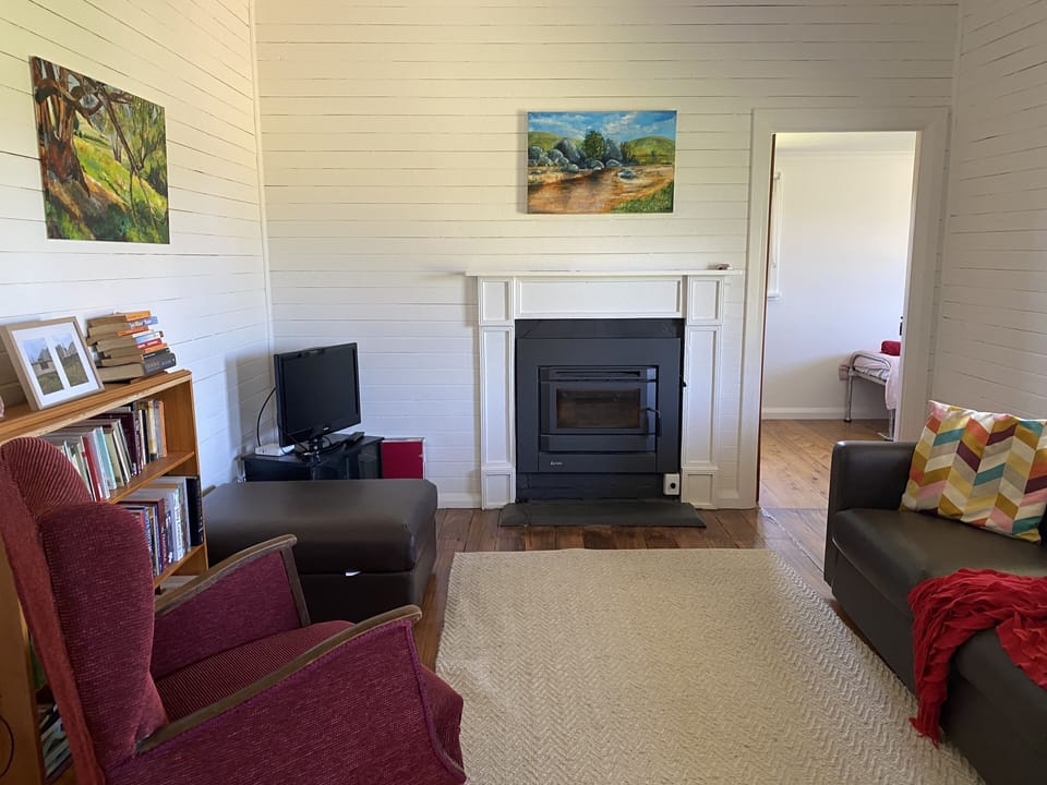 Lounge - now the nights are cool you snuggle in front of the wood fire.
