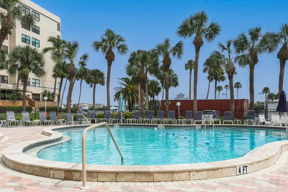 Enjoy the heated, community swimming pool next to the bay